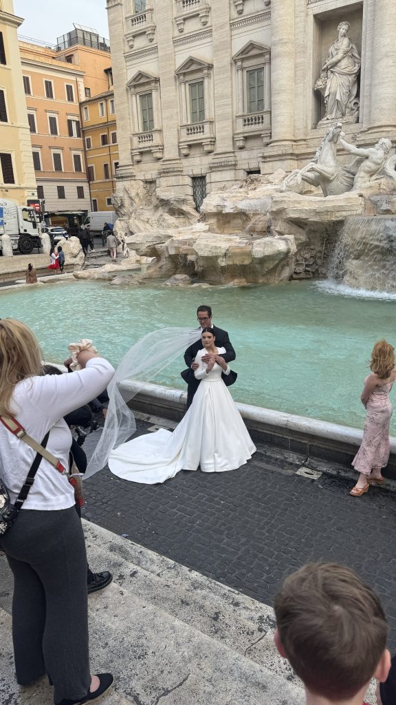 A bride at the trevi fountain