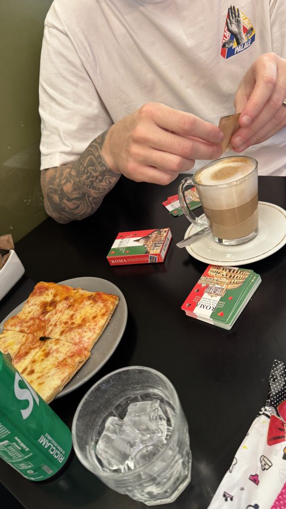coffee and pizza visiting the colosseum on a budget
