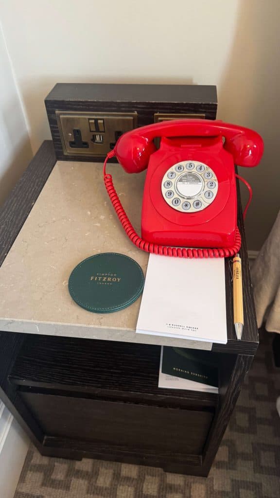 red phone in room at kimpton fitzroy