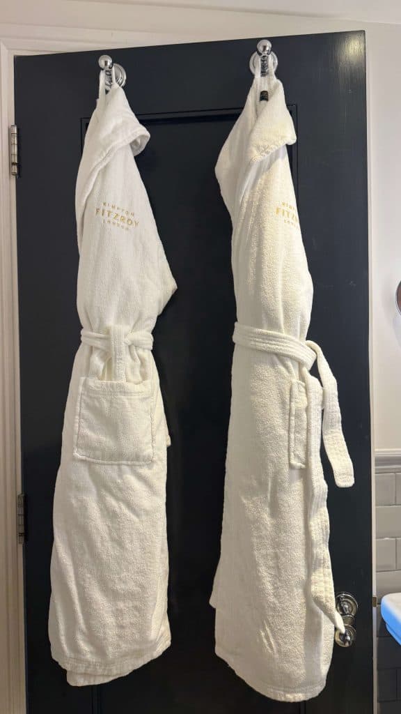 robes hanging on back of door
